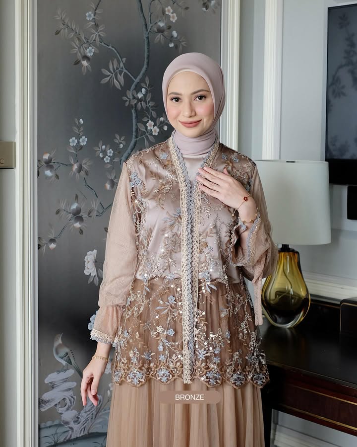 Ameena Outher 11
